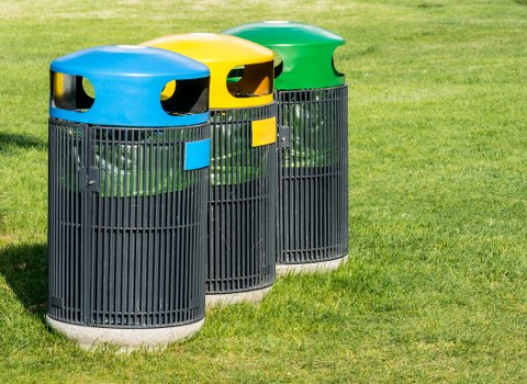 Business professionals discussing waste management solutions in an office setting